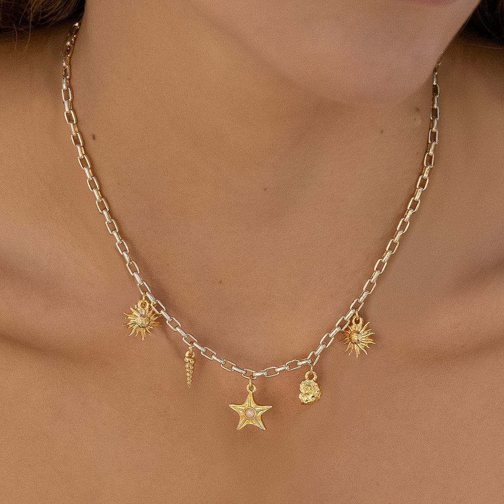 Colgante mini con dijes varios + topos