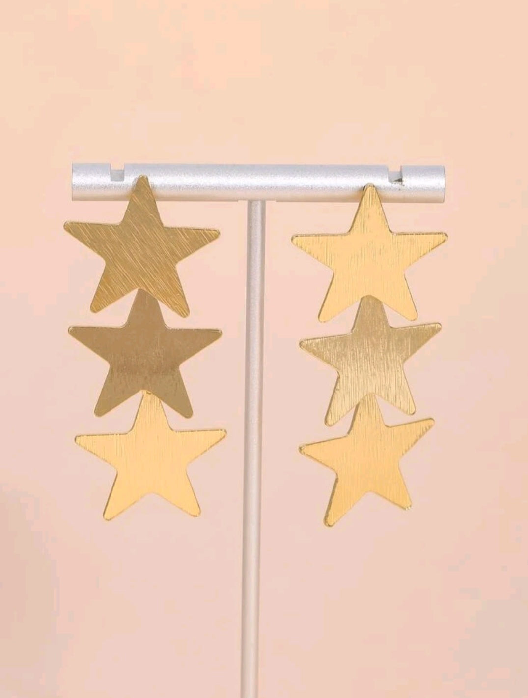 Pendiente estrella escala